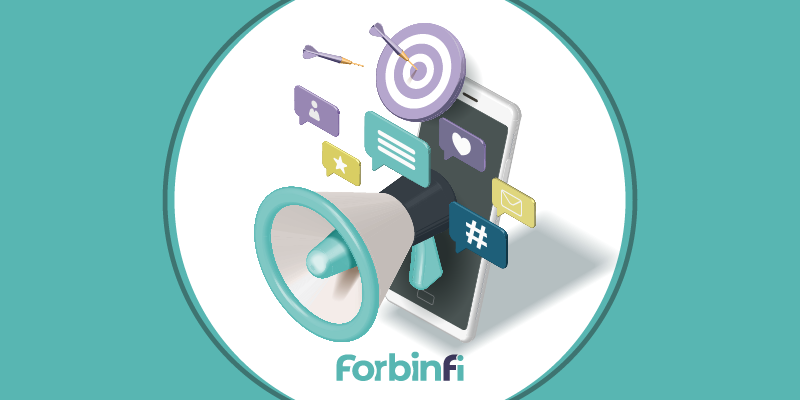 a smartphone with a megaphone on the screen and a target with arrows