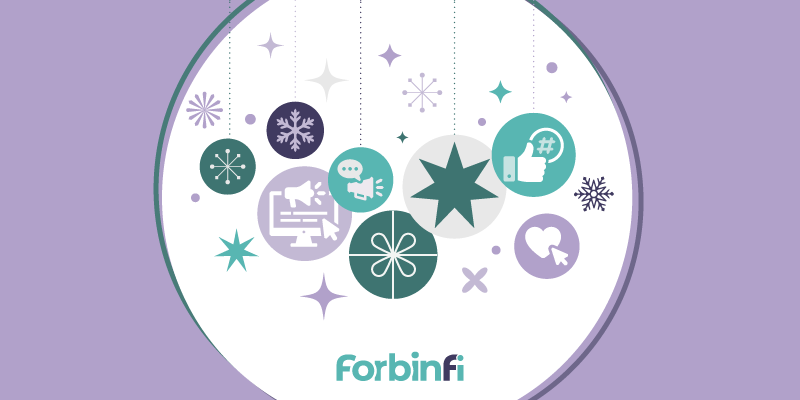 Holiday ornaments that have marketing elements in them like computer with clicks, heart with clicks, thumbs up with hashtag